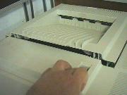 Depress
        the switch to open to printer