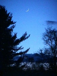 Moonset over water