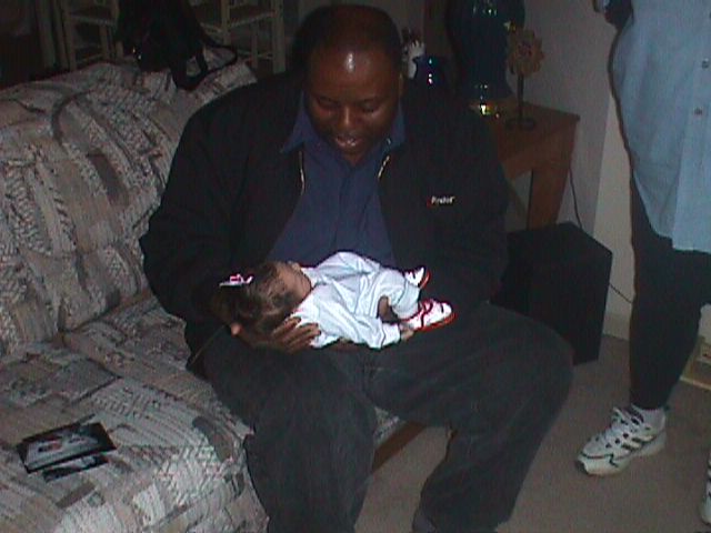 Makayla & Grandpa Charles. First day home, 2-26-2001.