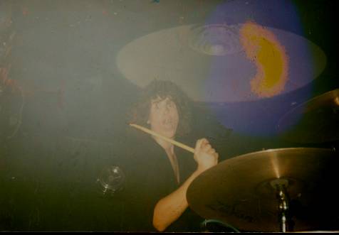 This is me in 1987 playing at a bar in Detroit called Harpo's, geeze can ya believe that hair?