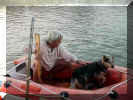 earl & bijou in dinghy.JPG (81835 bytes)