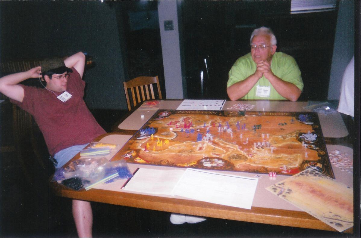 Paul and Chuck playing Napoleon 
In Europe at FlatCon 2004