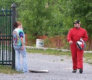 Michael talks to a fan after the race
