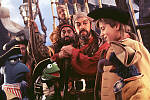 Sam the American Eagle as First Mate Mr Arrow, Kermit the Frog as Captain Smollett, Tim Curry as Long John Silver, Kevin Bishop as Jim Hawkins, and Gonzo appearing as himself, aboard the Hispaniola