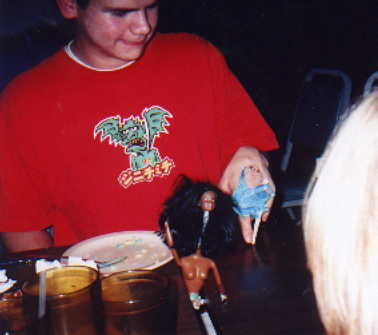 Hey James is playing with Josh's dolls.