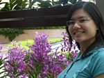 With beautiful orchids in Pan Pacific Hotel