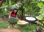 Posing with a giant durian!