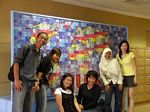 Posing with the NUS Spectrum - a puzzle whose pieces contain messages from NUS students