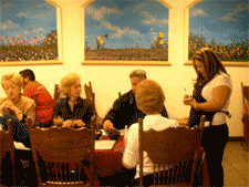 Danielle taking another order for group of diners. Get yours seats early as we fill up early!