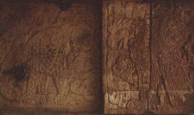 Carving of Eagle and ? on small pyramid at Chich�n Itz�