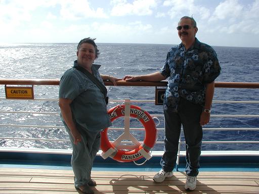 mom and dad by the water