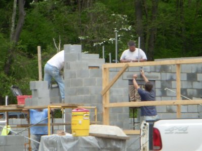 Fuller Lake Bathhouse-masons laying block.