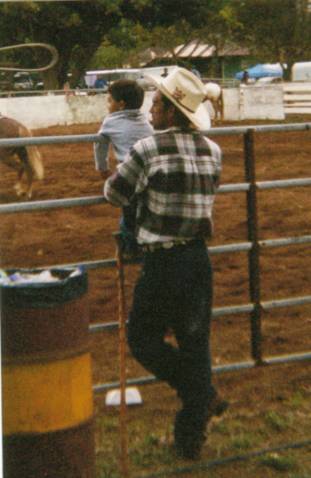 David and son at the Na'alehu Rodeo
Photo by Mitchell "Mickey" Lasco, 2005