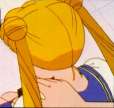 Haruka touching Usagi's shoulder