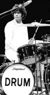MICKY PLAYING THE DRUMS AT A CONCERT