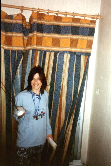 Her first (stolen) metal in Fencing ...Beware Petty Mortals!!!