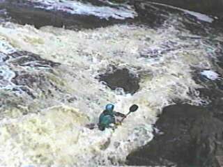Running a 'sneak' on the falls on the Upper Baptism