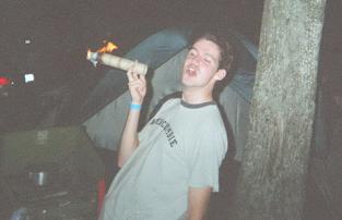 Davey D smoking a towel roll