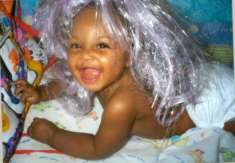 Lil' Juicy is wearing wigs early