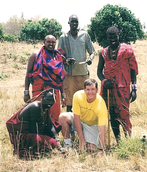 Planting a tree (dedicated in Katelyn's name) as part of the Masai tribe's reforestation project