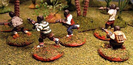 Militia patrol the bush in The Congol