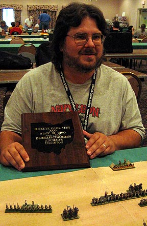 John Lawitzke shows off his Overall DBA Champion plaque
