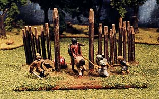 Mounted raider leads in his bound catch of two locals bound for the slave market
