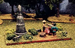 Asian camp followers have set up a market near a ruined stupa