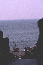 A fishing boat pulled up on the beach in Beer.