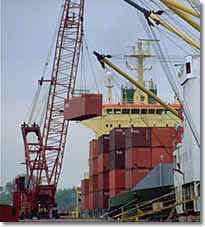 Zonyx Report Photo:  Loading Containers on Deck by Crane [Courtesy Federal Maritime Terminals]
