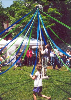 beltane's maypole dance>

The Queen of Hearts in spring holds sway<br> 
None can resist her green charms in May.<br> 
When the maypole rises and drama ensues<br> 
Below her blue skirt lies her precious clue. 
<p> 
