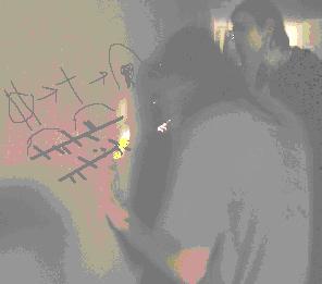  Some ogham scribblings and a diagram on the wall of the chamber beneath Mai Fete island