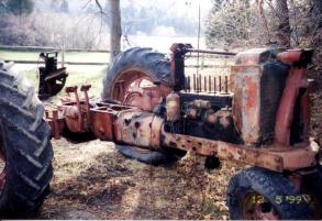 Farmall H sitting outside and apart