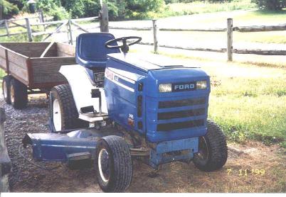 Ford LGT 145 lawn tractor with 1 ton dump cart