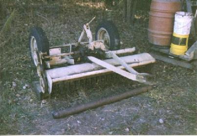 Mott mower being repaired