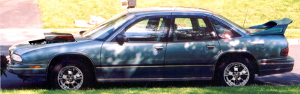 My 1993 Regal with chrome rims, spoiler, and hood scoop. All fake images.