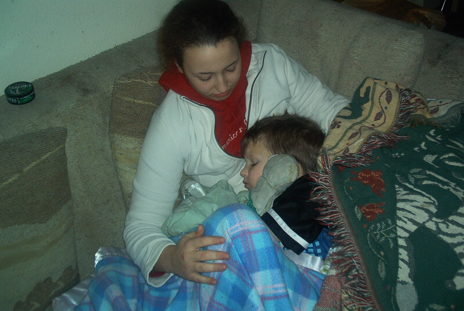 Brittany comforting her sick little bro - what a great gal she is!!!