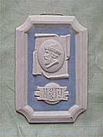 A small  plaque  `Yaroslav-The-Wise`  representation souvenir of  Novgorod State University .�=