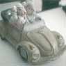 Sculpture of a VW Beetle driven by two rats.