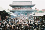 Just A Few People Visiting The Shrine