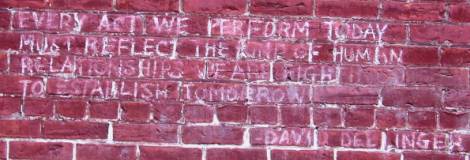 Quote on a brick wall. 