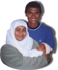 Mishaal with Mum and Dad