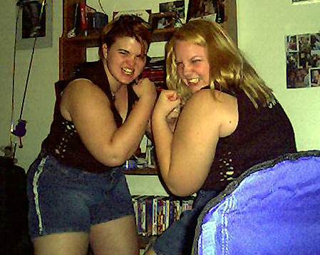 kerry and I show off our muscles at our "we bought a stove" party
