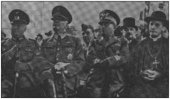 A high-ranking Catholic priest does his very utmost to warn the world about Hitler - by sitting next to him and pretending to do nothing.