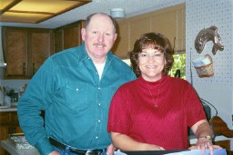 Mom & Darrell opening their anniversary gift