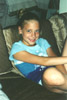 Click to see me sitting on our couch last summer