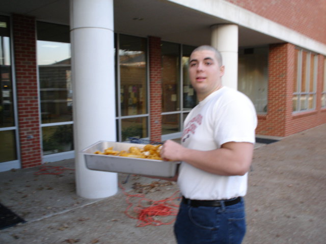John Cobb prepares to being the fish up to the dining room