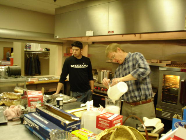 Dave Lake and Joe Oliaro work in the kitchen