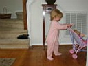 amanda_circles_the_house_with_stroller.JPG