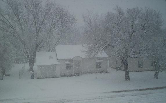 Our nieghbors across the street have a white house.&nbsp; If it wasn't for the darkened windows, I could barely see it!